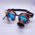 Bronze steampunk goggles with blue lenses and spiked sides