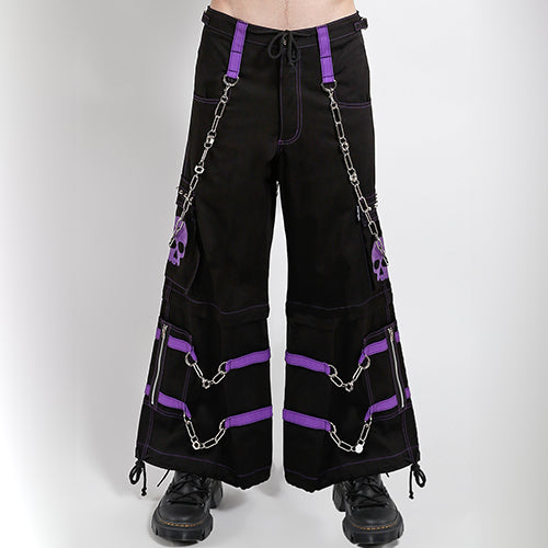 Black Tripp NYC zip-off pants with purple straps, purple skull print and chains