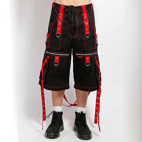 Black and red Tripp NYC X-strap zip-off pants