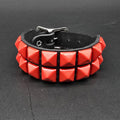 Two Row Pyramid Buckle Bracelet, red pyramids on black leather