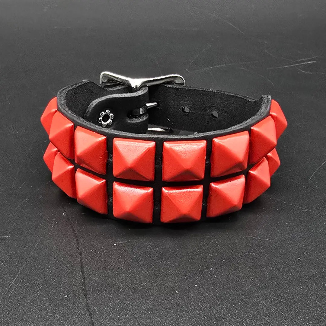 Two Row Pyramid Buckle Bracelet, red pyramids on black leather