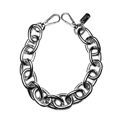 Chunky silver Tripp NYC super link chain worn as a choker and as a wallet chain