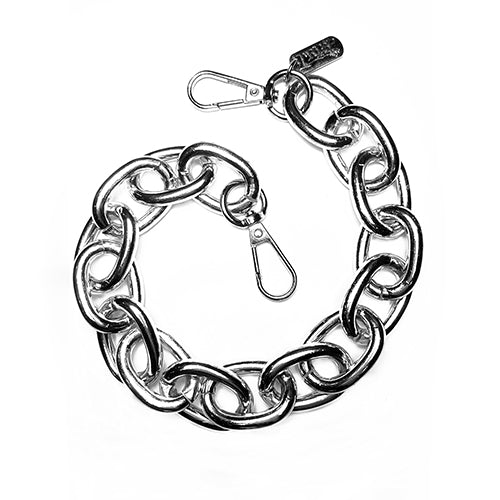 Chunky silver Tripp NYC super link chain worn as a choker and as a wallet chain