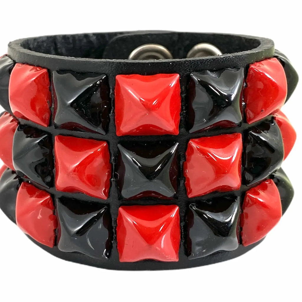 Three Pyramid Stud Checkered Snap Cuff, red and black checkerboard front close-up