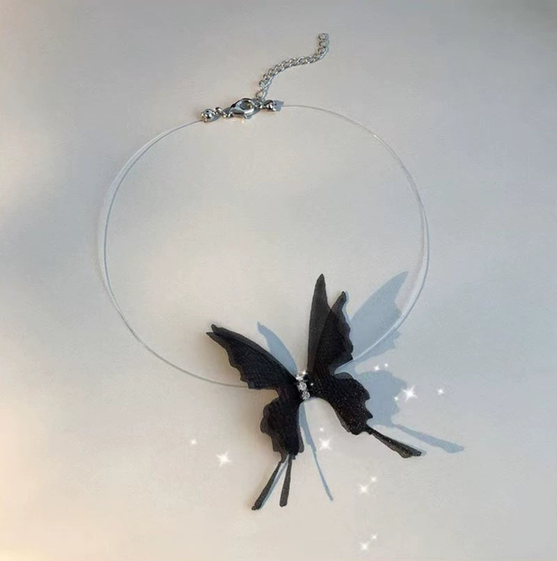Floating Butterfly Necklace, black butterfly on clear line