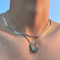 Sunburst Spike Layered Necklace, layered silver snake chain necklace with spiked sunburst pendant
