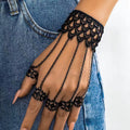Web Weaver Lace Hand Harness, black lace cuff with five chained filigree rings