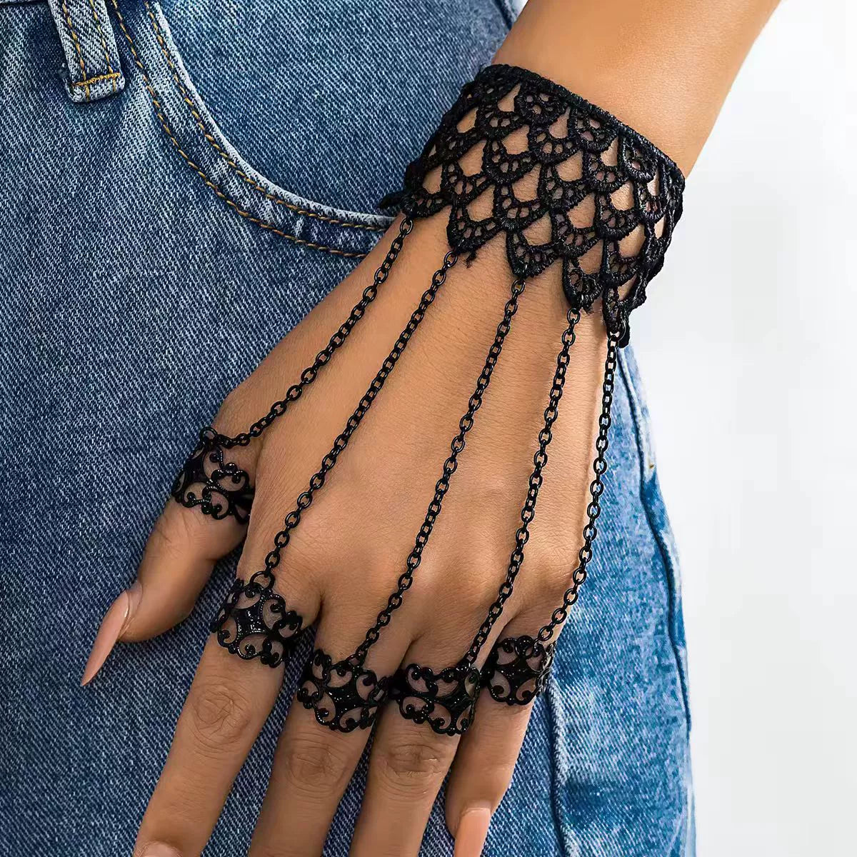 Web Weaver Lace Hand Harness, black lace cuff with five chained filigree rings
