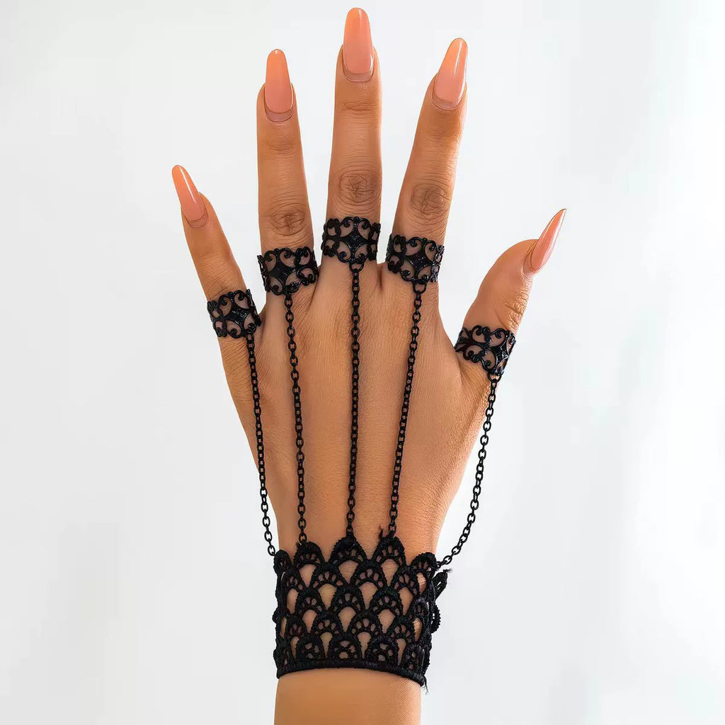 Web Weaver Lace Hand Harness, black lace cuff with five chained filigree rings