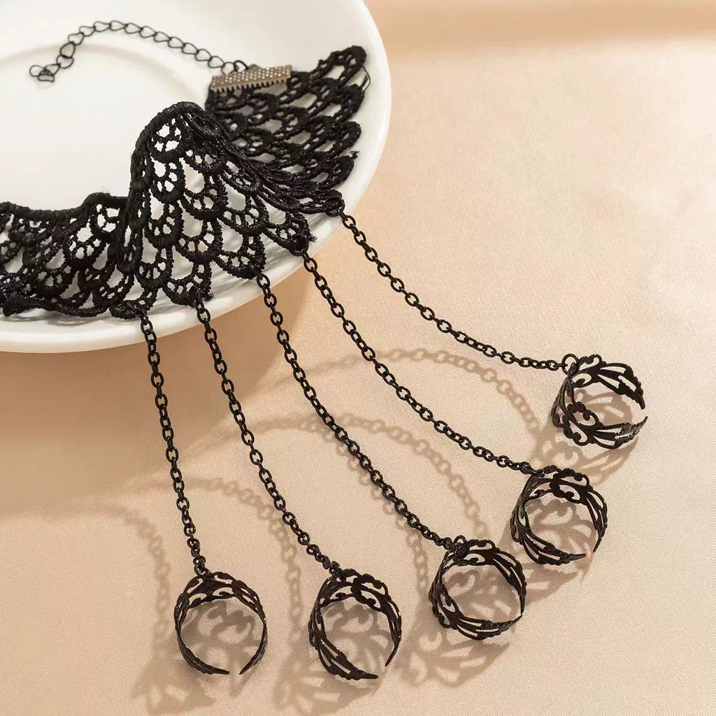 Web Weaver Lace Hand Harness, black lace cuff with five chained filigree rings