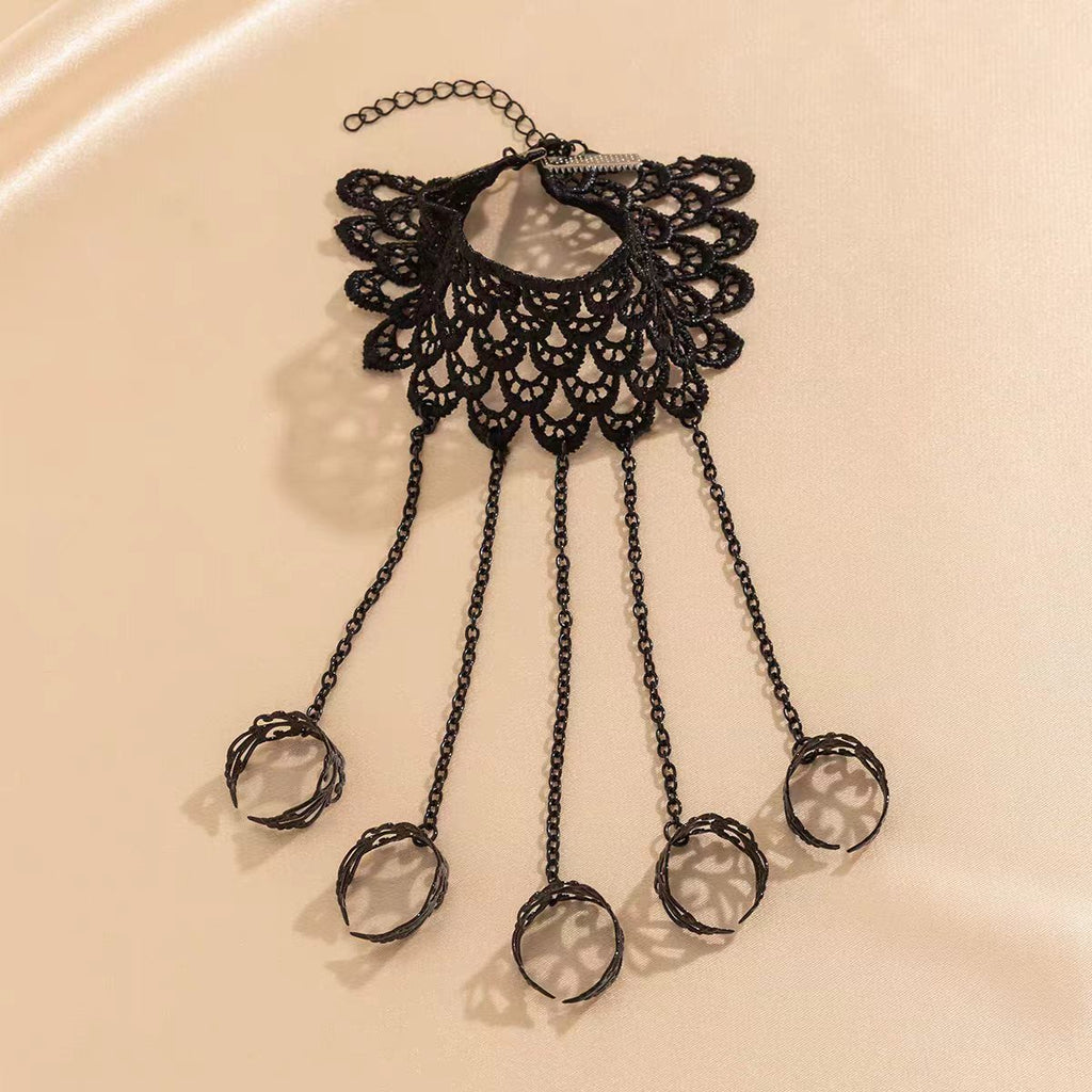 Web Weaver Lace Hand Harness, black lace cuff with five chained filigree rings