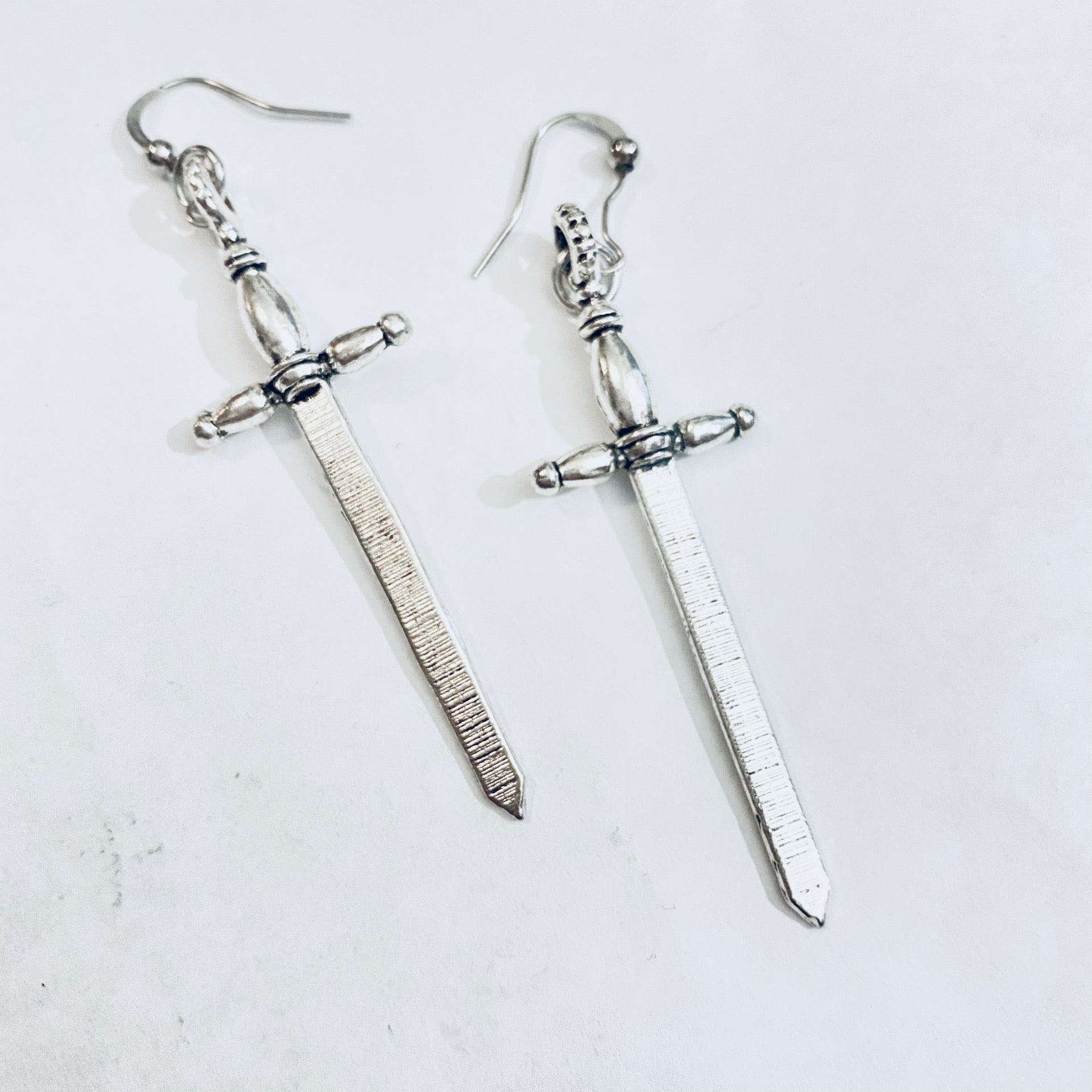 Treason Earrings