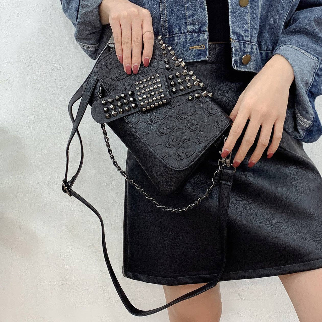 Riveted Embossed Skull Shoulder Bag: Pure Black