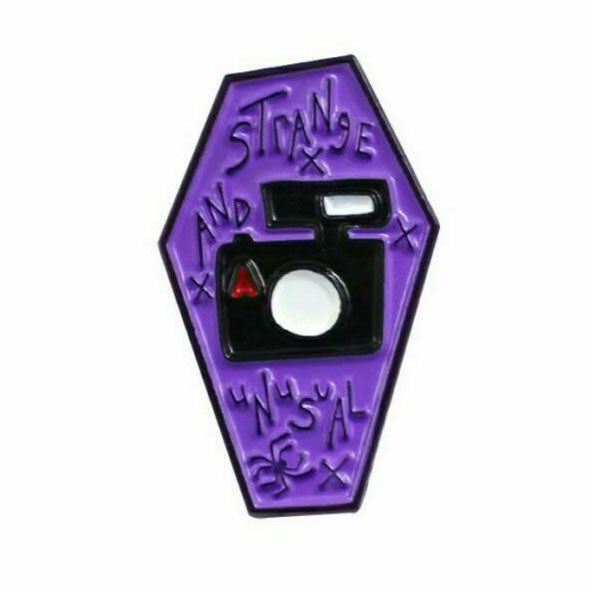 Strange and Unusual Enamel Pin
