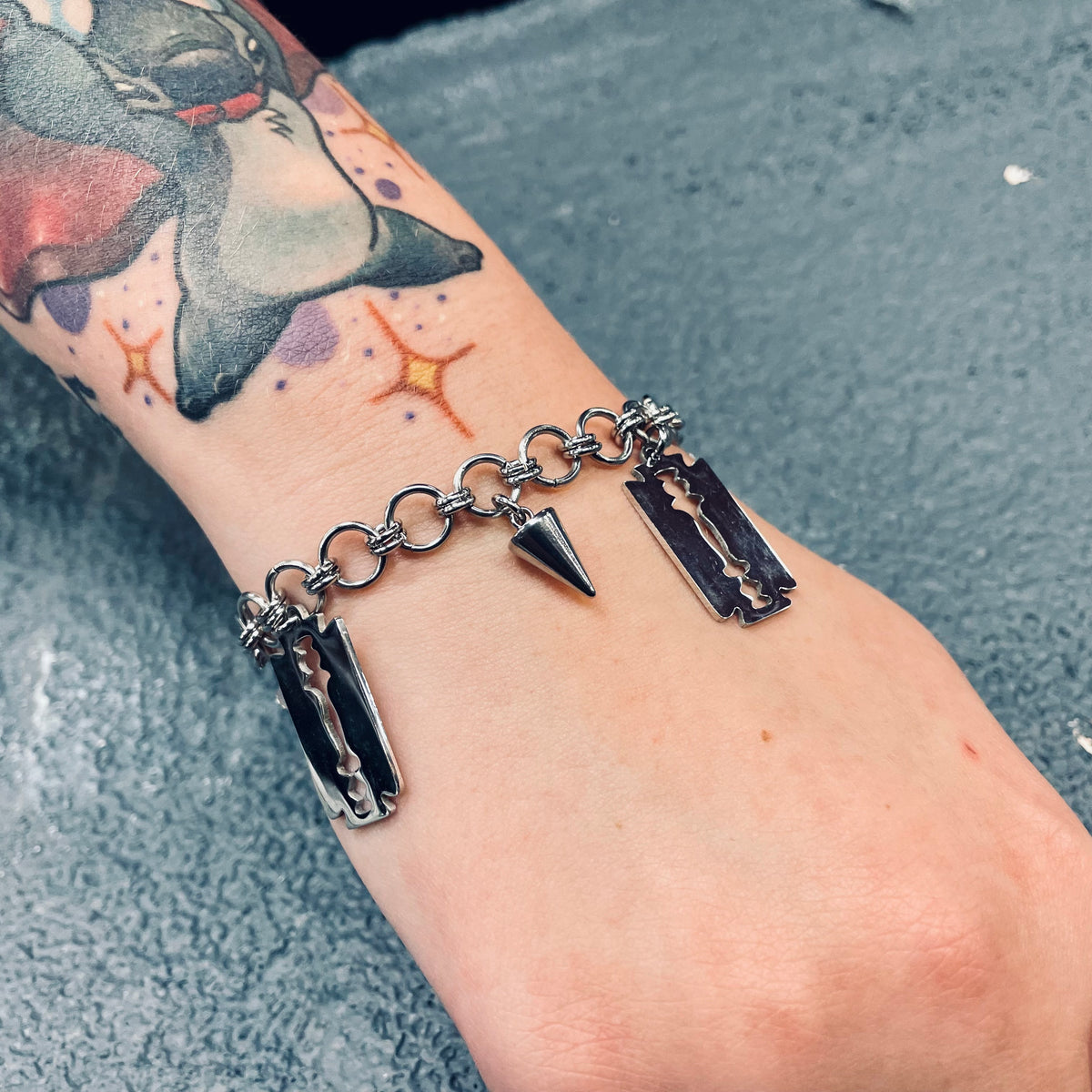 Cutthroat Charm Bracelet
