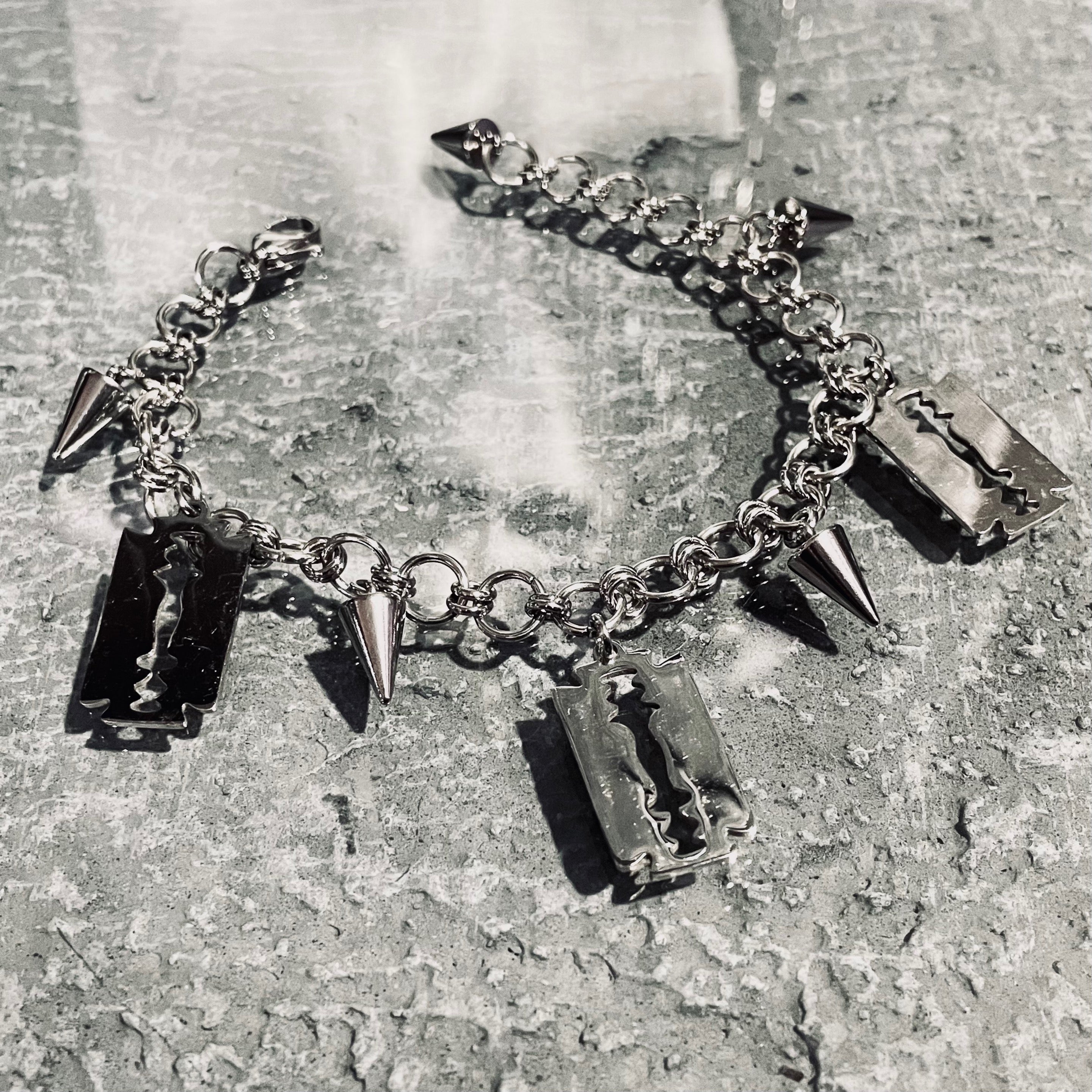 Cutthroat Charm Bracelet