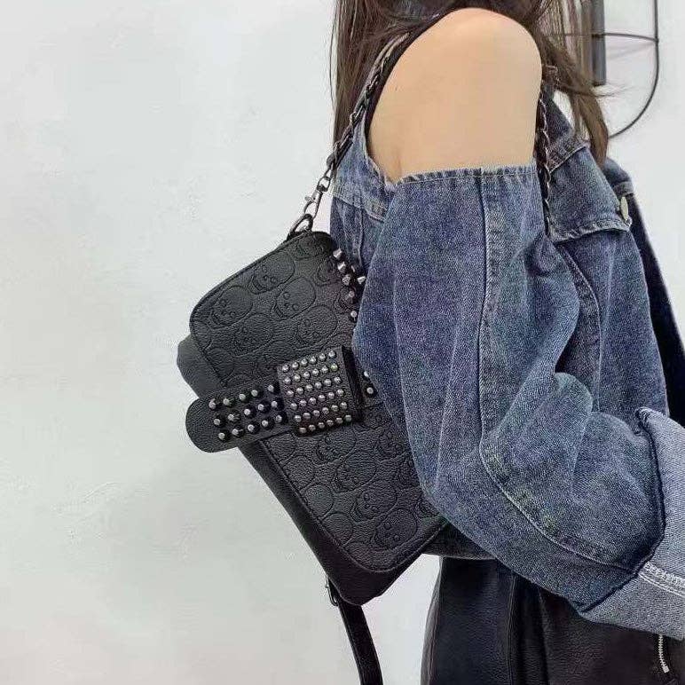 Riveted Embossed Skull Shoulder Bag: Pure Black