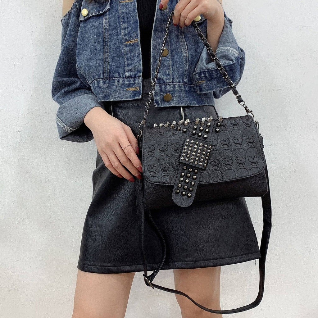 Riveted Embossed Skull Shoulder Bag: Pure Black
