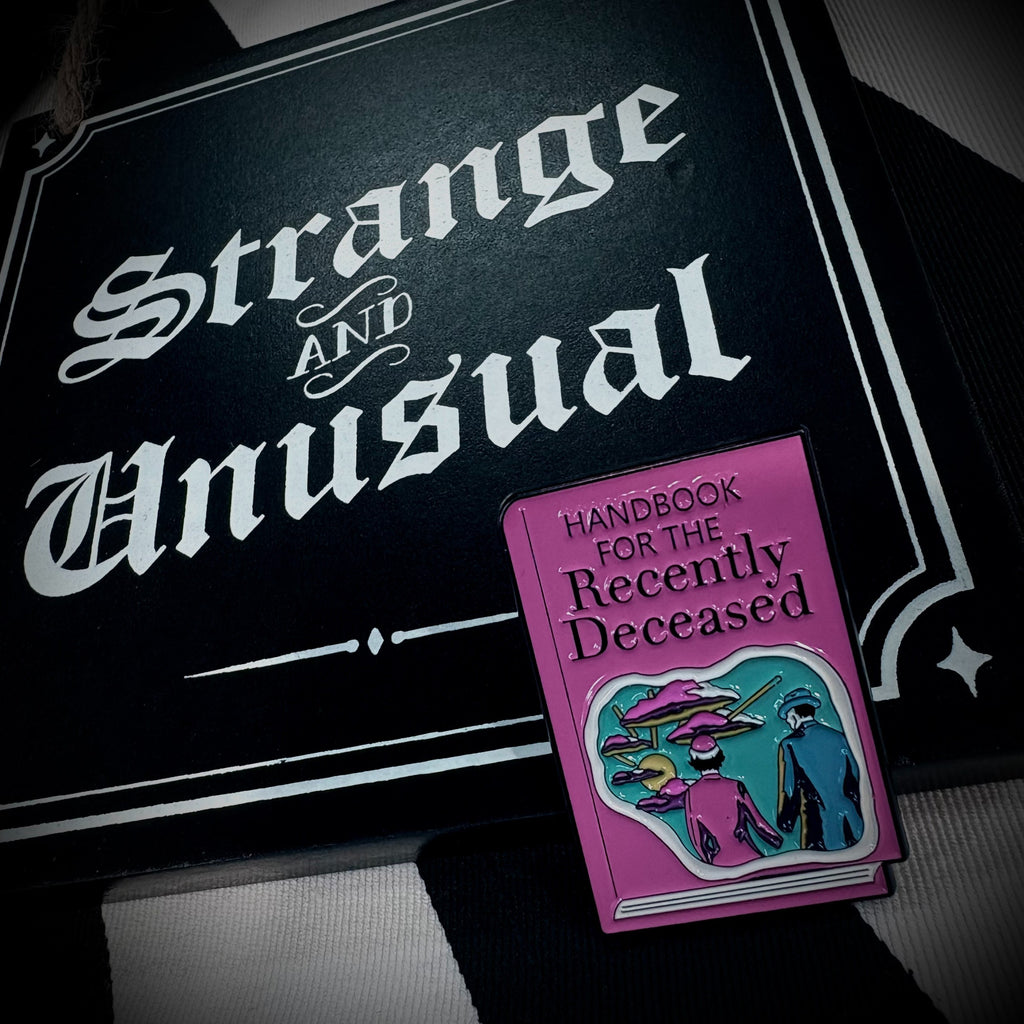 Strange and Unusual Mini Sign