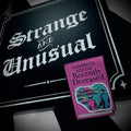 Strange and Unusual Mini Sign