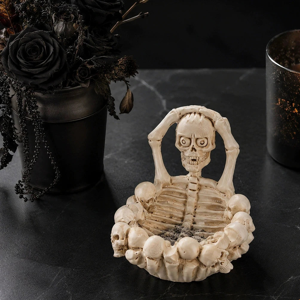 Bone Pit Skeleton Ashtray, bone skeleton ashtray ringed with skulls