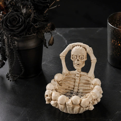 Bone Pit Skeleton Ashtray, bone skeleton ashtray ringed with skulls