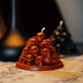 Catacomb Skull Pile Candle, Red, stacked skull tower candle