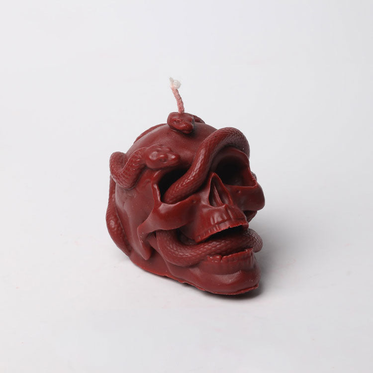 Serpent's Nest Skull Candle, Red, skull candle with coiled snakes